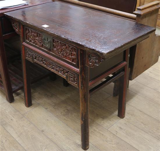 A Chinese carved side table, W.96cm